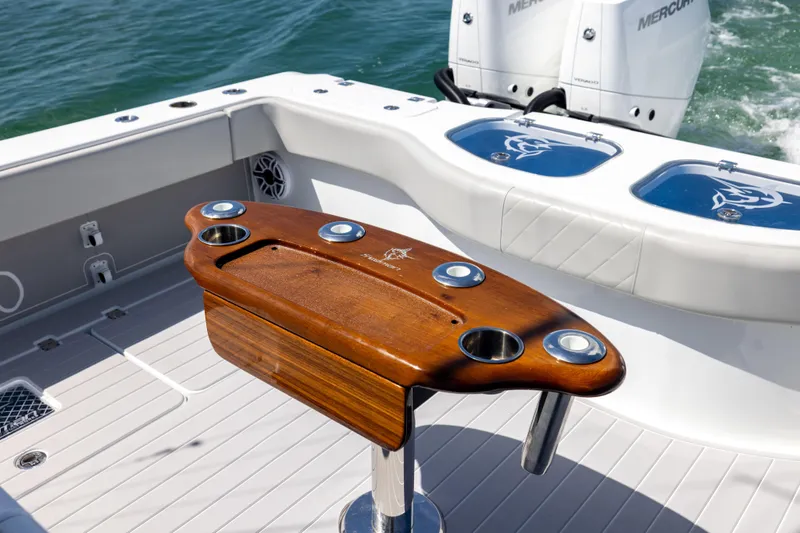  Yacht Photos Pics 2024 Freeman 43 boat deck with wooden table and dual Mercury engines.