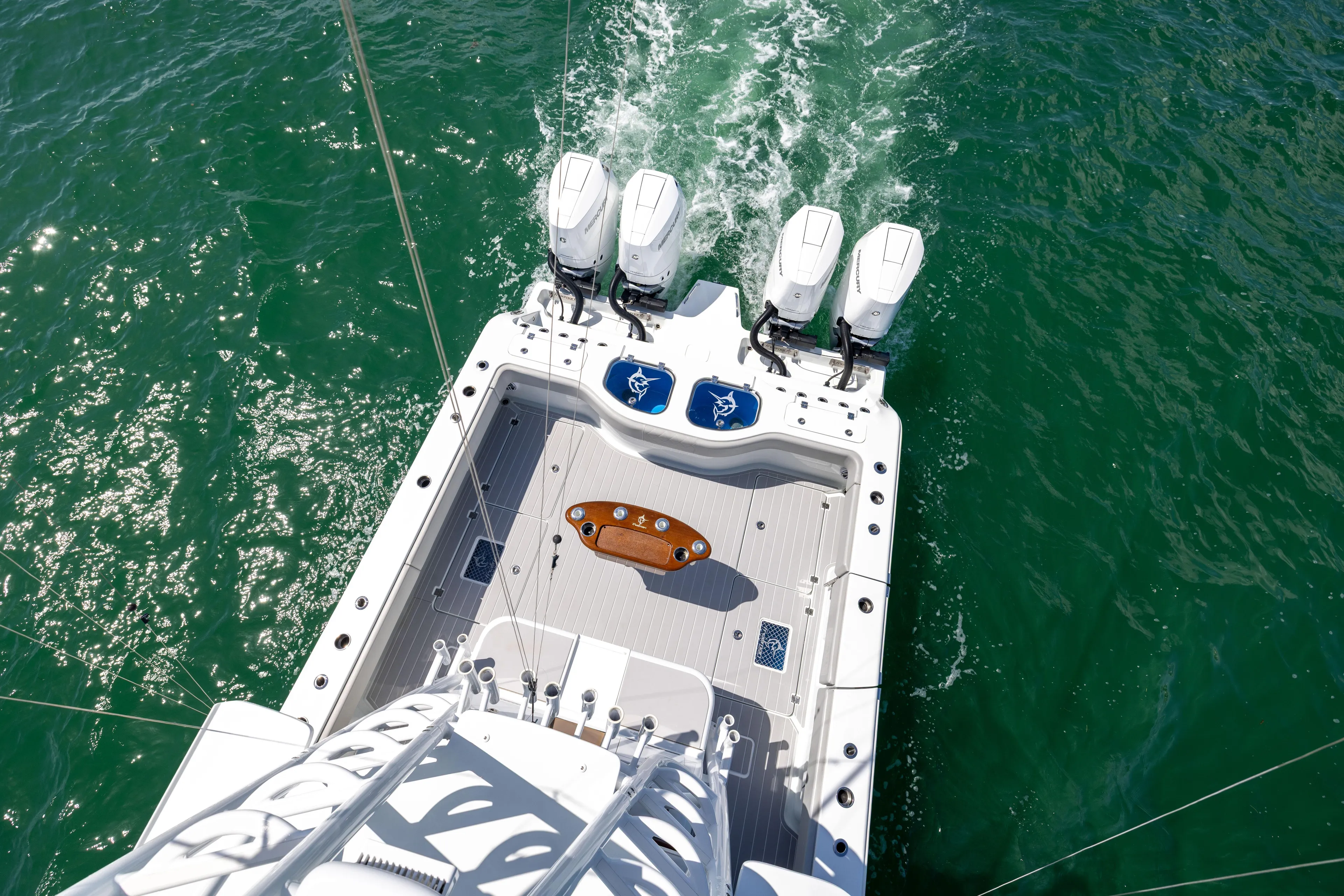  Yacht Photos Pics Aerial view of 2024 Freeman 43 boat with four engines on open water.