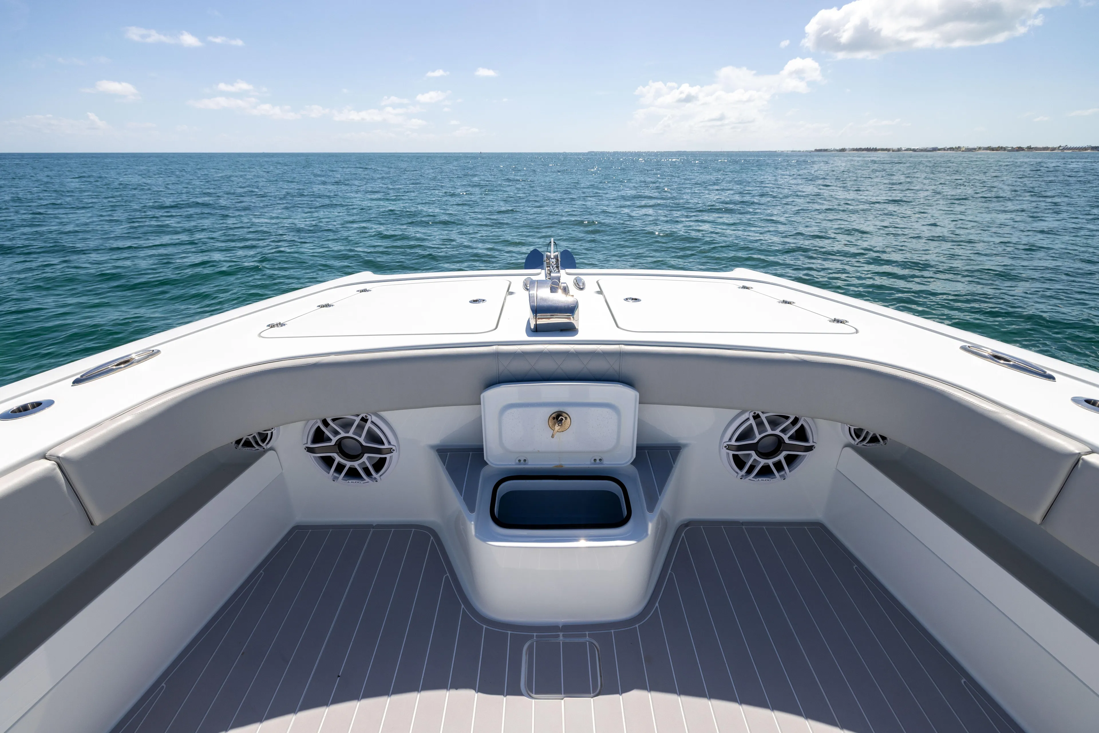  Yacht Photos Pics Bow view of 2024 Freeman 43 boat on open sea under clear sky.