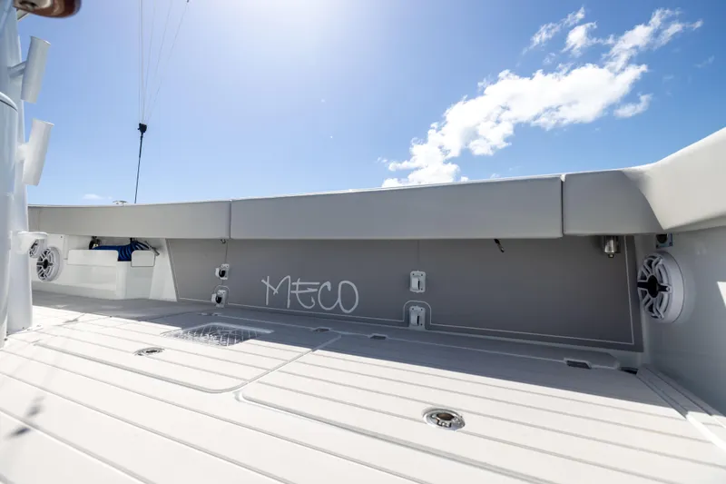  Yacht Photos Pics 2024 Freeman 43 boat deck under clear blue sky, featuring modern design and speakers.