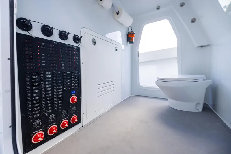  Yacht Photos Pics 2024 Freeman 43 boat interior with control panel and modern toilet.