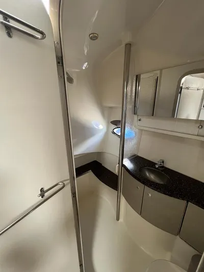  Yacht Photos Pics 2006 Formula 40 Performance Cruiser bathroom with modern fixtures and sleek design.