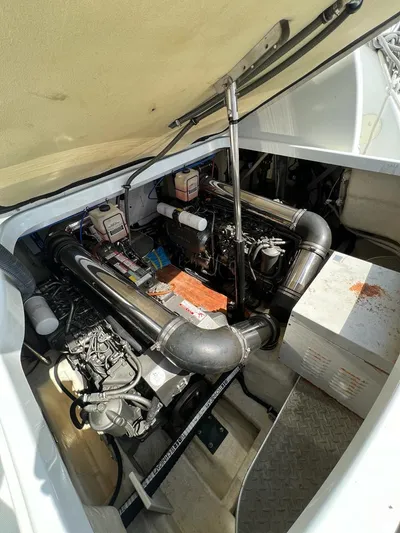  Yacht Photos Pics Engine compartment of a 2006 Formula 40 Performance Cruiser, showcasing mechanical components.