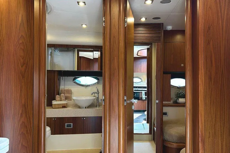 Elentari Yacht Photos Pics Luxurious interior of 2009 Sunseeker Predator 72 yacht, featuring elegant wood finishes and modern amenities.
