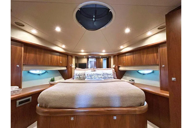 Elentari Yacht Photos Pics Luxurious interior of 2009 Sunseeker Predator 72 yacht with elegant wood finish.