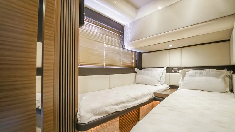 Brigadone Yacht Photos Pics Luxurious cabin interior of 2016 Azimut 55S yacht with twin beds and modern design.