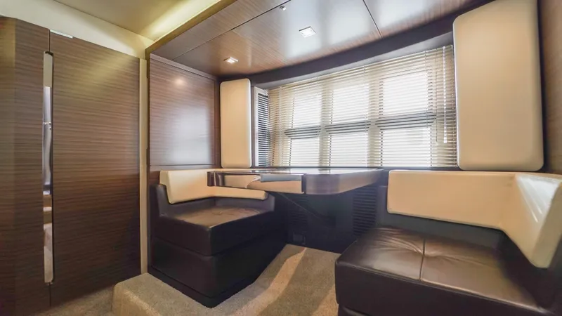 Brigadone Yacht Photos Pics Luxurious interior of 2016 Azimut 55S yacht with modern seating and elegant wood finishes.