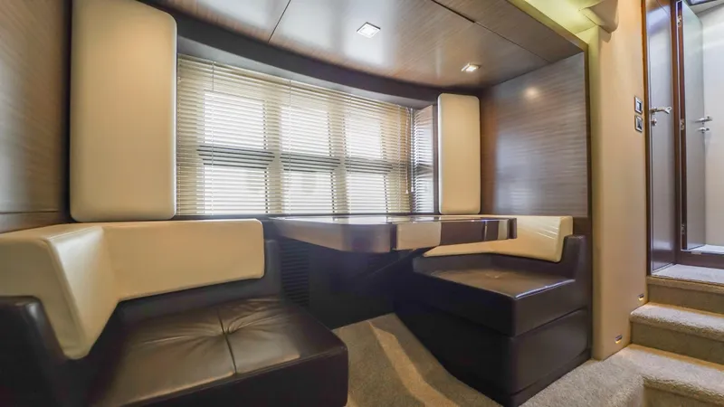 Brigadone Yacht Photos Pics Luxurious interior of 2016 Azimut 55S yacht with modern seating and elegant design.