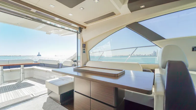 Brigadone Yacht Photos Pics Luxurious interior of 2016 Azimut 55S yacht with ocean view.