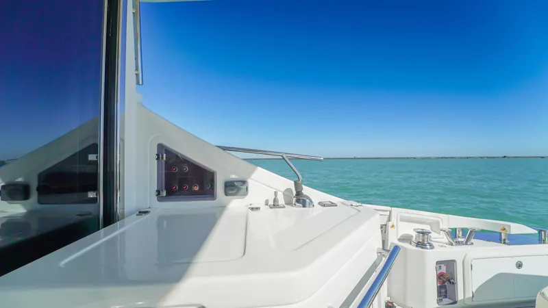 Brigadone Yacht Photos Pics 2016 Azimut 55S yacht deck with ocean view under clear blue sky.