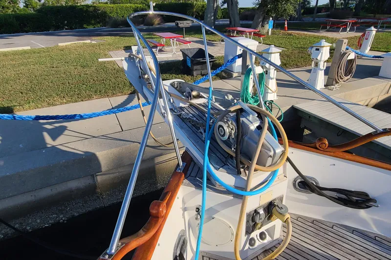 Breakaway Yacht Photos Pics Bow of 2000 Grand Banks 46 Classic yacht docked, featuring ropes and equipment.