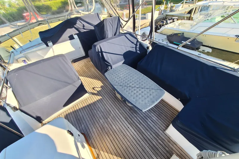 Breakaway Yacht Photos Pics Spacious deck of 2000 Grand Banks 46 Classic yacht with covered seating.