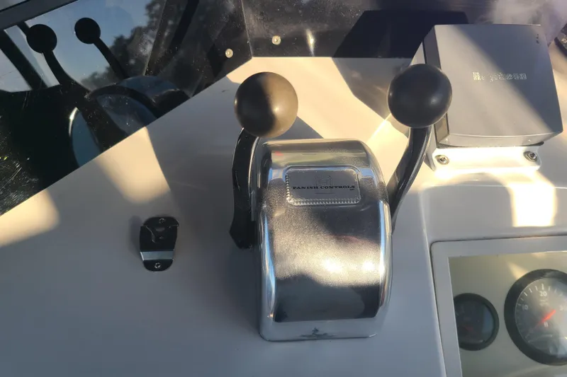 Breakaway Yacht Photos Pics Control panel of a 2000 Grand Banks 46 Classic yacht with throttle levers.