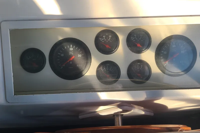 Breakaway Yacht Photos Pics Instrument panel of a 2000 Grand Banks 46 Classic boat, featuring various gauges.