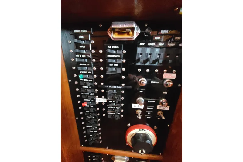 Breakaway Yacht Photos Pics Control panel of a 2000 Grand Banks 46 Classic yacht with switches and indicators.