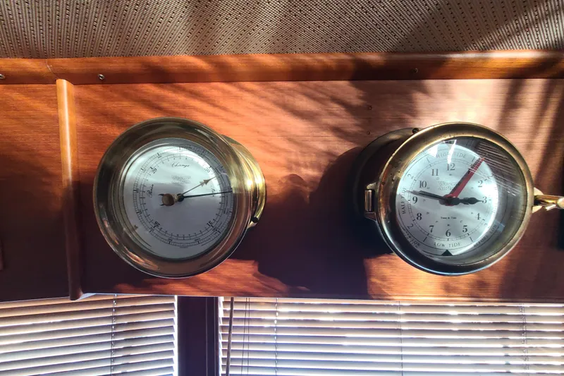 Breakaway Yacht Photos Pics Brass barometer and clock on Grand Banks 46 Classic yacht, 2000 model.