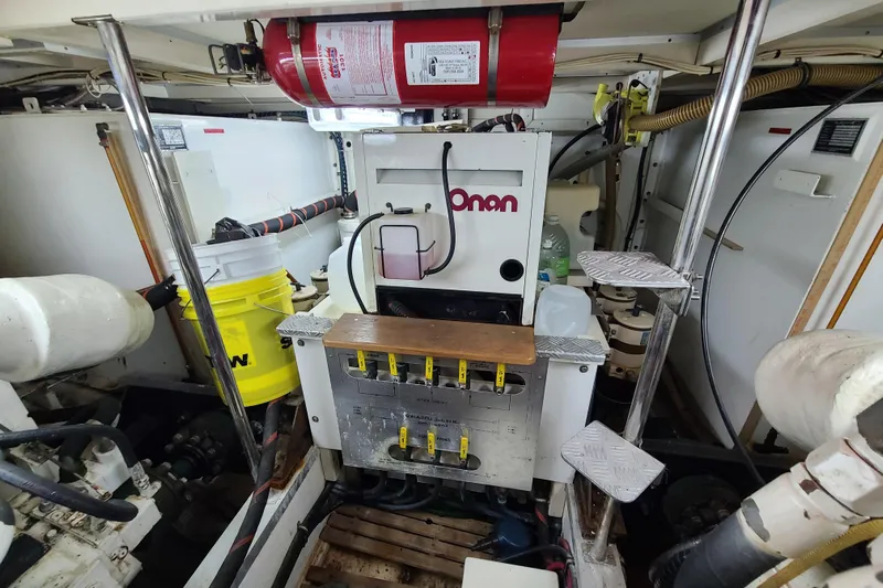 Breakaway Yacht Photos Pics Engine room of 2000 Grand Banks 46 Classic with Onan generator and equipment.