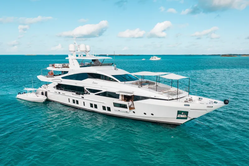 Emina Yacht Photos Pics Luxury yacht Benetti Veloce 140, 2014 model, cruising on turquoise waters under a clear sky.