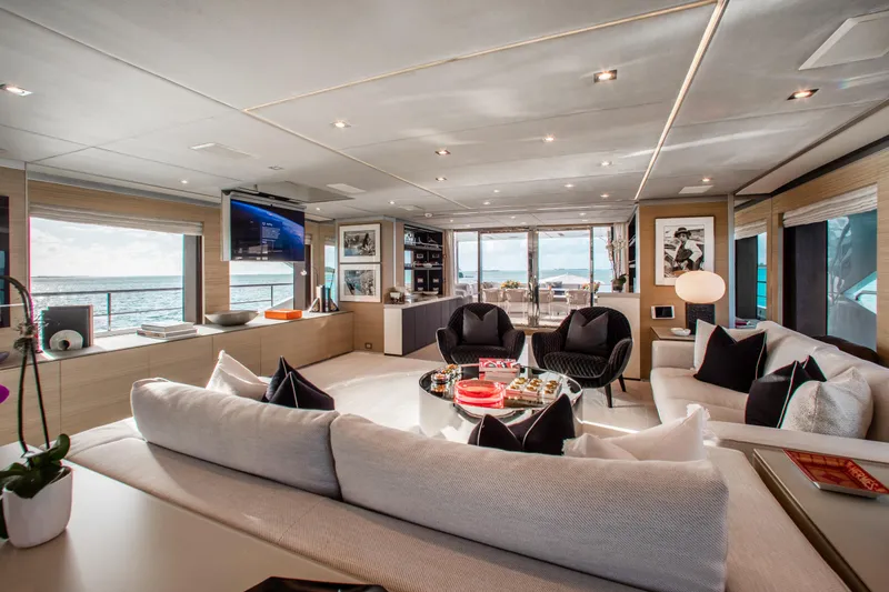 Emina Yacht Photos Pics Luxurious interior of 2014 Benetti Veloce 140 yacht with modern furnishings and ocean view.