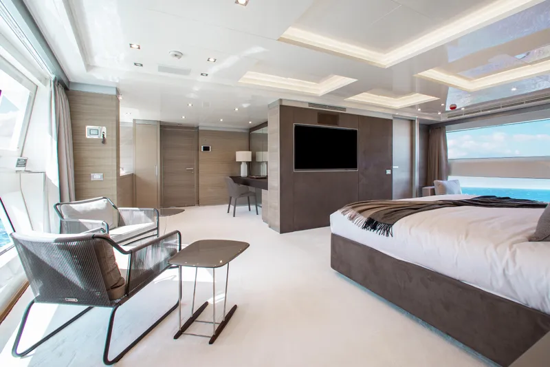 Emina Yacht Photos Pics Luxurious interior of 2014 Benetti Veloce 140 yacht with modern furnishings and ocean view.
