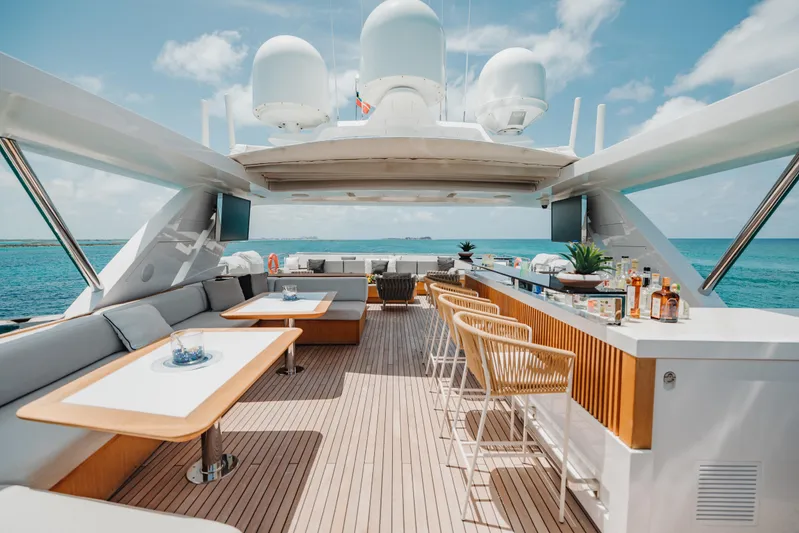 Emina Yacht Photos Pics Luxurious 2014 Benetti Veloce 140 yacht deck with bar and ocean view.