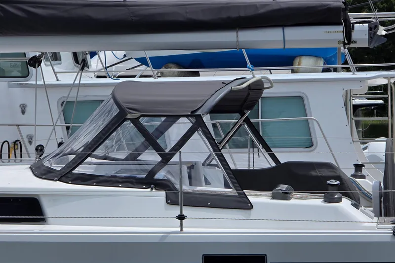 Quantum Yacht Photos Pics 2014 Hanse 385 sailboat with protective canopy and sleek design.