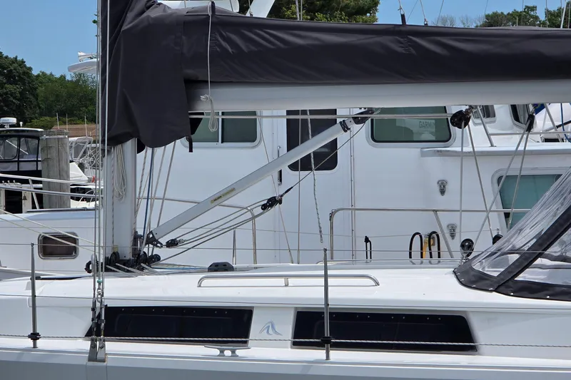 Quantum Yacht Photos Pics 2014 Hanse 385 sailboat docked, featuring sleek design and modern rigging.