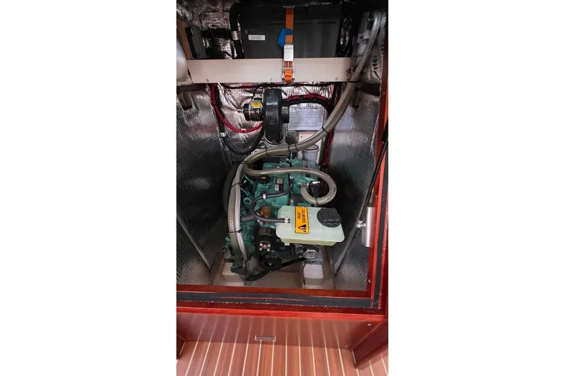 Quantum Yacht Photos Pics Engine compartment of a 2014 Hanse 385 sailboat, showcasing mechanical components.