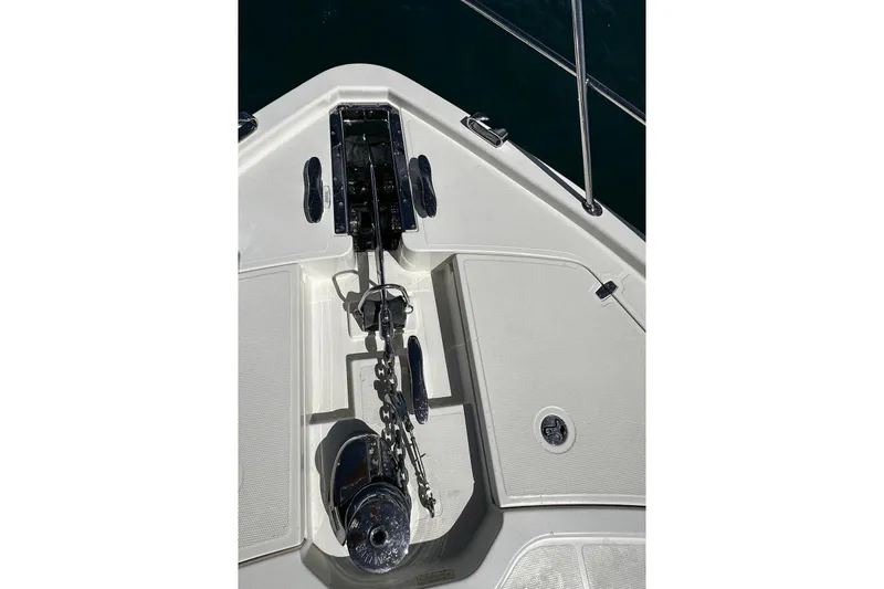  Yacht Photos Pics Bow of 2023 Riviera 465 SUV yacht with anchor chain and winch.