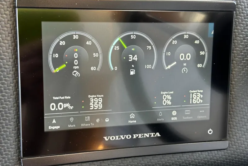  Yacht Photos Pics Volvo Penta display on 2023 Riviera 465 SUV showing engine metrics and fuel rate.