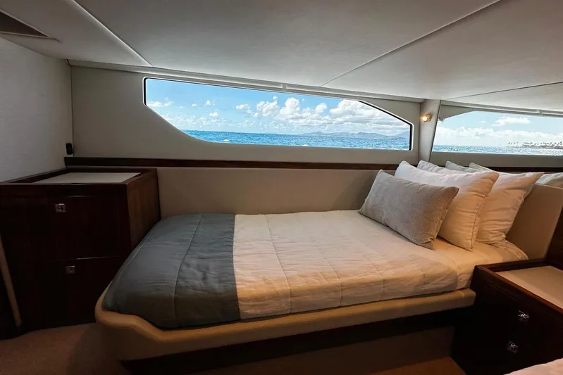  Yacht Photos Pics Luxurious interior cabin of 2023 Riviera 465 SUV yacht with ocean view.