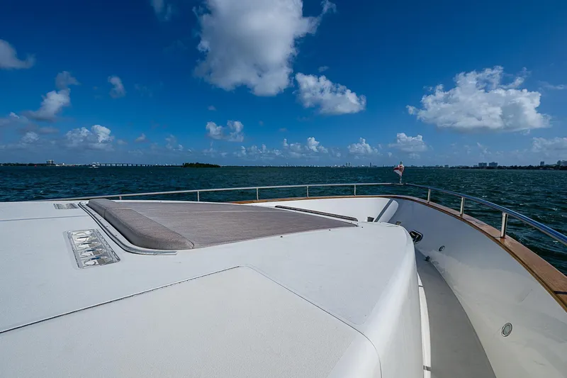 The Usual Yacht Photos Pics Bow view of 2000 Horizon 82 yacht cruising on a sunny day.