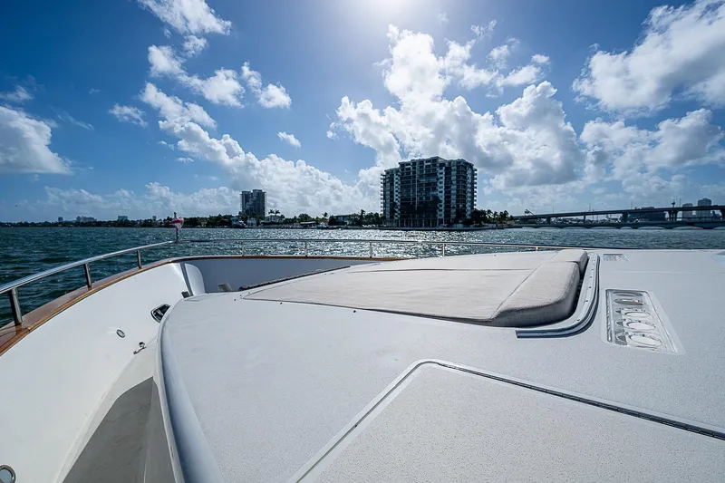 The Usual Yacht Photos Pics Luxurious Horizon 82 yacht deck with city skyline and ocean view, 2000 model.