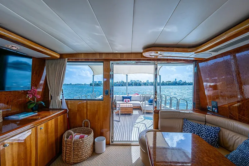 The Usual Yacht Photos Pics Luxurious interior of 2000 Horizon 82 yacht with ocean view and elegant furnishings.