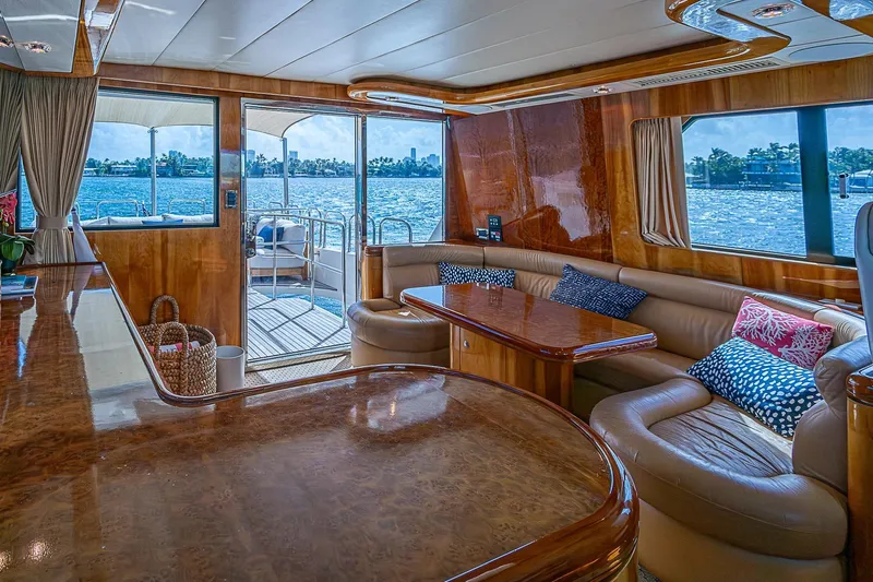 The Usual Yacht Photos Pics Luxurious interior of 2000 Horizon 82 yacht with elegant seating and ocean view.