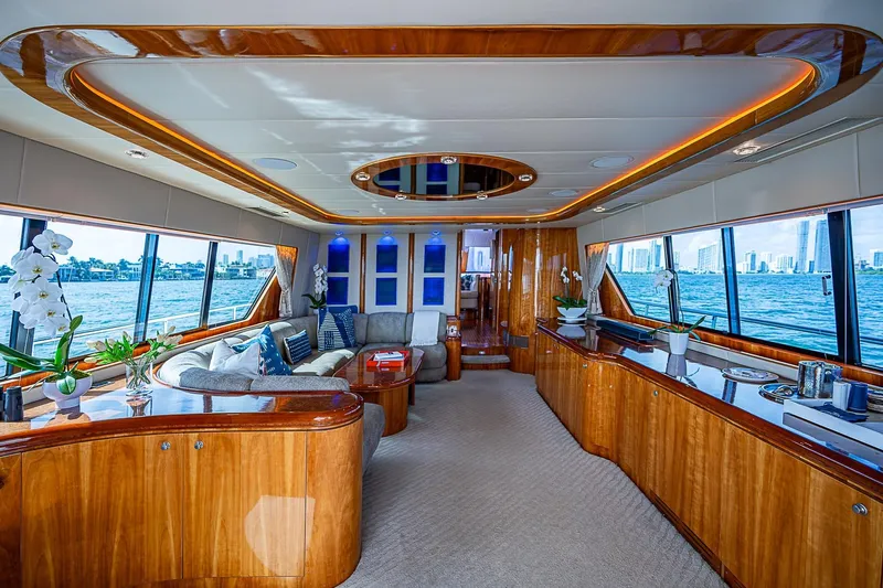 The Usual Yacht Photos Pics Luxurious Horizon 82 yacht interior, 2000 model, featuring elegant wood finishes and panoramic ocean views.