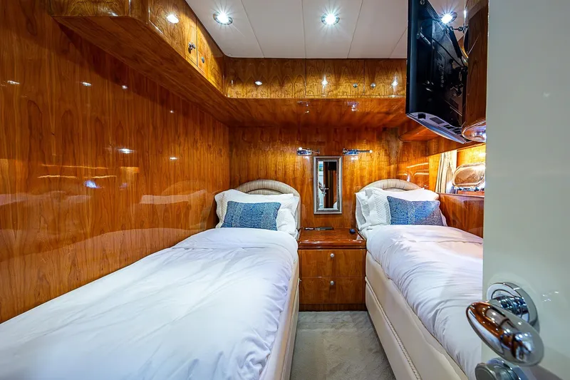 The Usual Yacht Photos Pics Luxurious twin cabin with wood paneling on Horizon 82 yacht, 2000 model.