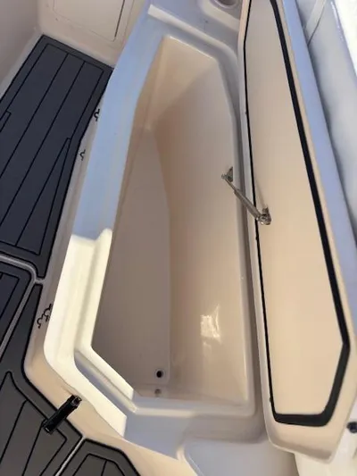 Get Hot Yacht Photos Pics Open storage compartment on 2011 Grady-White Canyon 306 boat.
