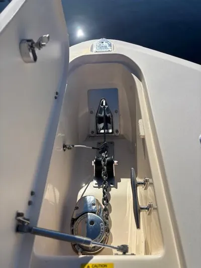 Get Hot Yacht Photos Pics Anchor compartment of 2011 Grady-White Canyon 306 boat with chain and winch.