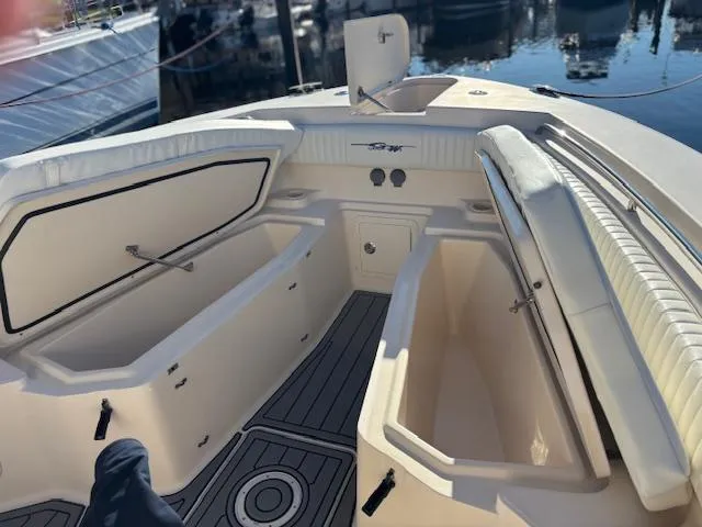 Get Hot Yacht Photos Pics 2011 Grady-White Canyon 306 boat interior with open storage compartments.