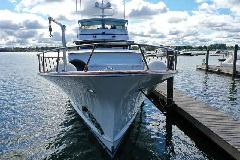  Yacht Photos Pics 1988 Burger 80 Motor Yacht docked on a sunny day, front view.