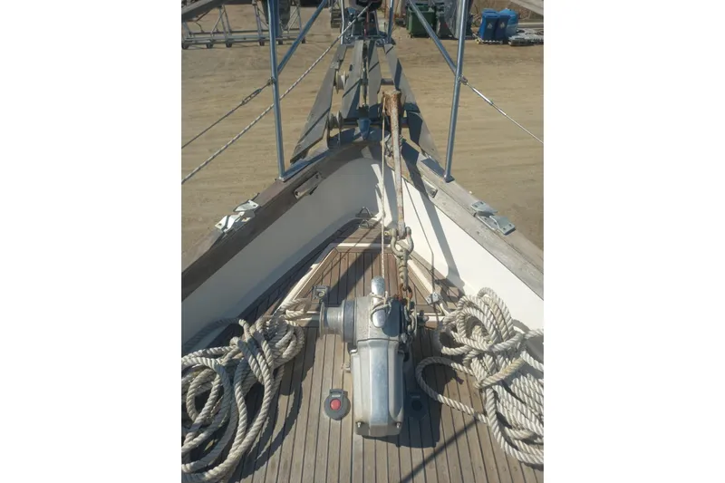 Yacht Photos Pics Deck view of 1994 Siltala Nauticat 38 sailboat with ropes and winch.