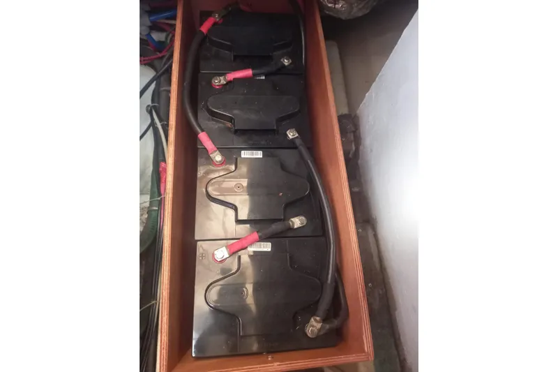  Yacht Photos Pics Battery compartment of a 1994 Siltala Nauticat 38 sailboat, showing connected batteries.