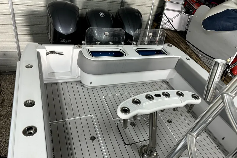  Yacht Photos Pics 2014 Contender 39 ST boat deck with rod holders and dual livewells.