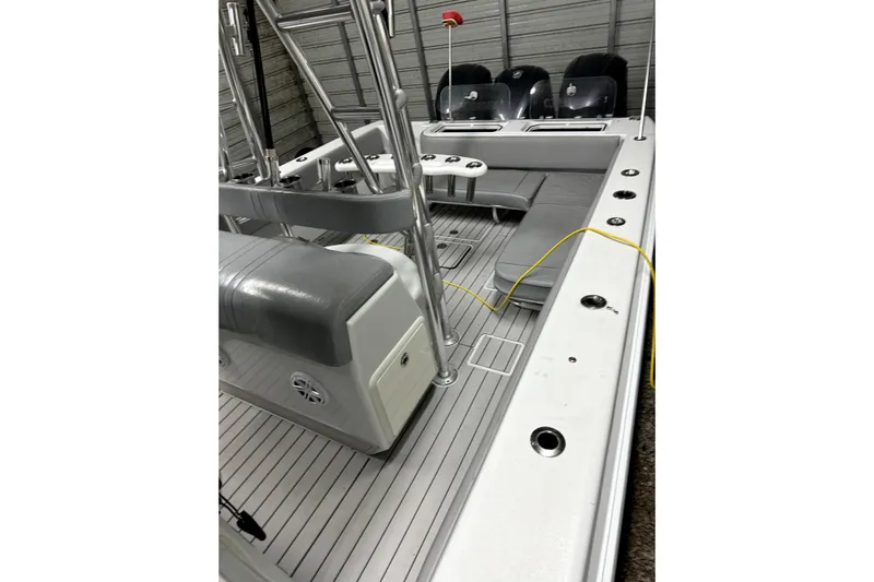  Yacht Photos Pics 2014 Contender 39 ST boat interior with seating and fishing rod holders.