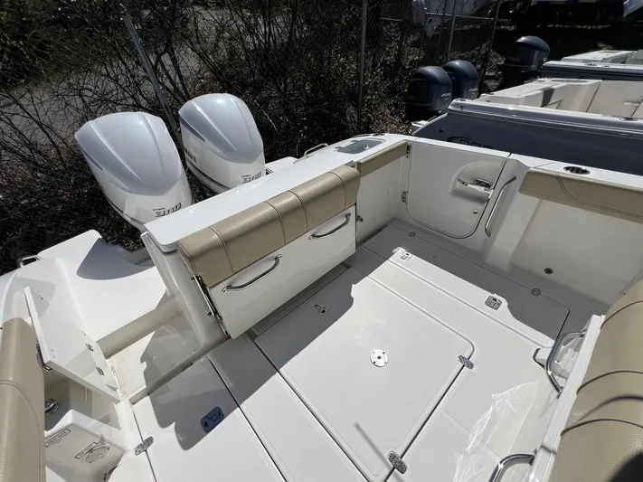  Yacht Photos Pics 2019 Pursuit S 288 Sport boat with dual engines and spacious seating area.