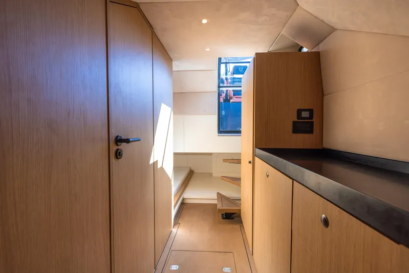  Yacht Photos Pics Modern interior of 2023 Lekker 44 yacht with wood finish and sleek design.