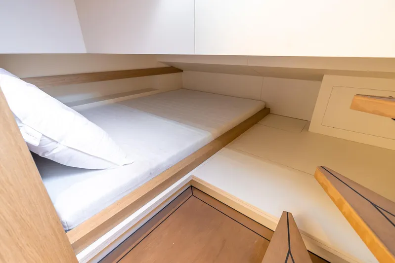  Yacht Photos Pics Cozy cabin interior of 2023 Lekker 44 yacht with minimalist design.