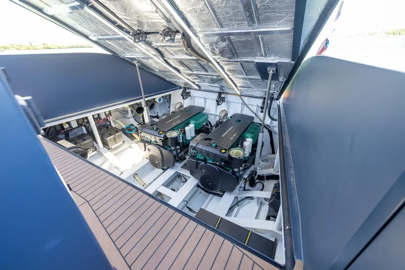  Yacht Photos Pics Engine compartment of 2023 Lekker 44 boat with dual engines and modern design.