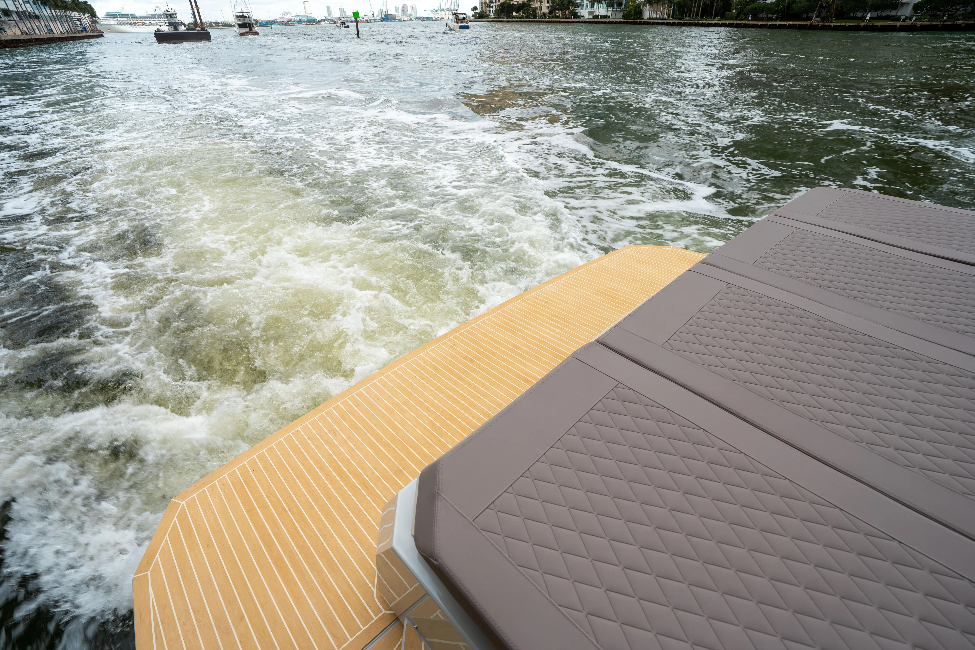  Yacht Photos Pics 2025 De Antonio Yachts D42 Open cruising on water, showcasing elegant deck design.